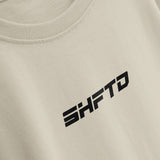 SHFTD Core T-Shirt in Beige - close-up of the print detail