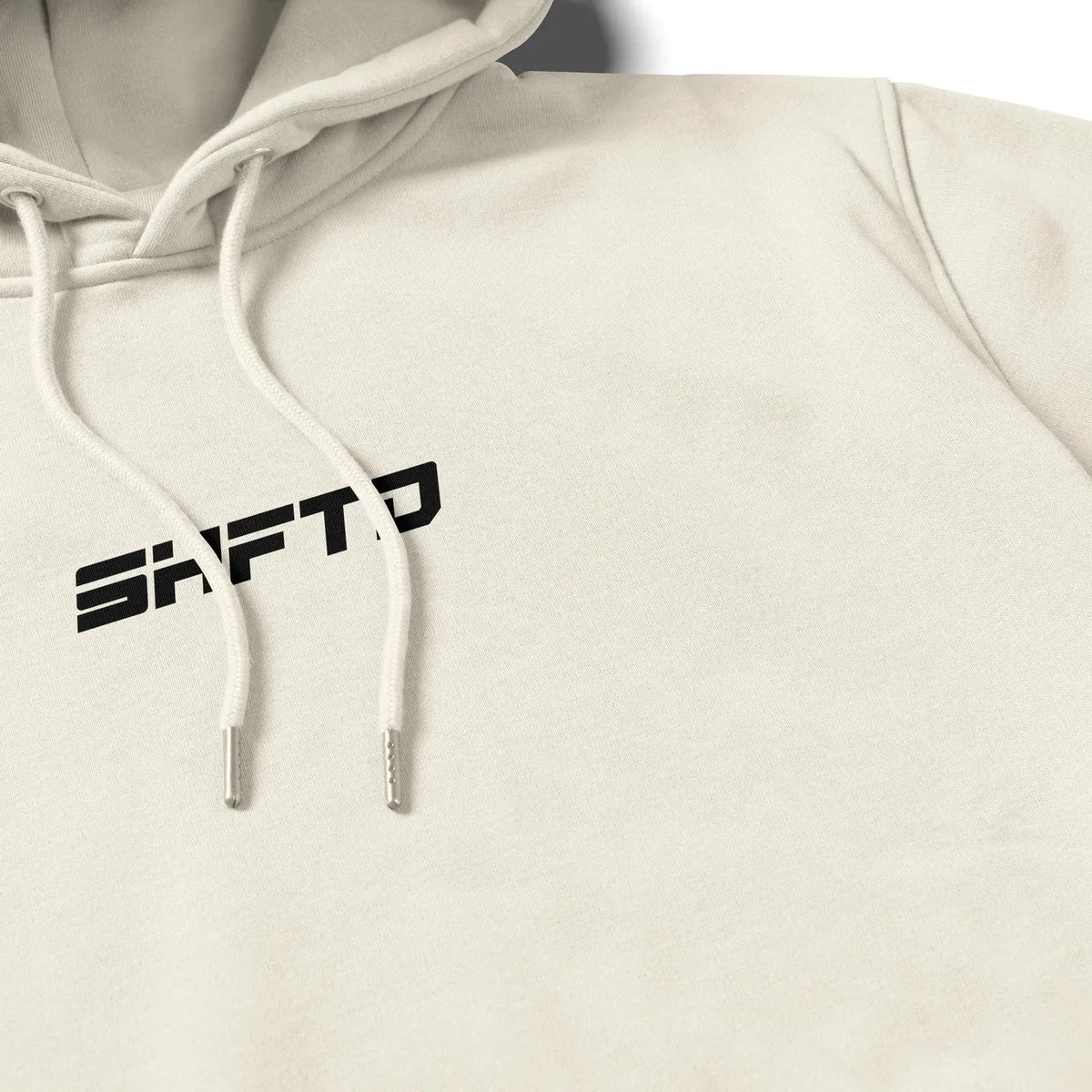 SHFTD Hoodie in Beige - close-up of the print detail